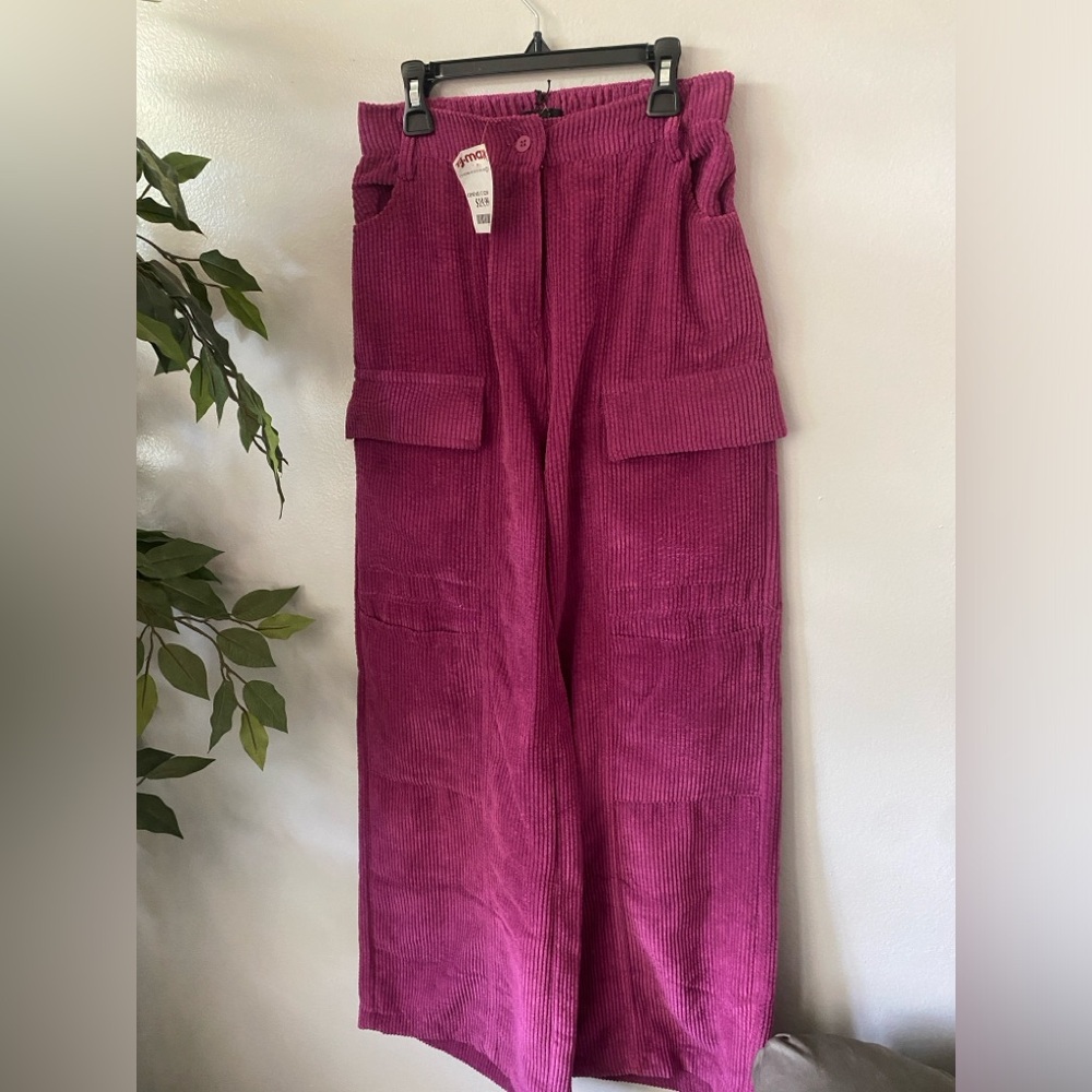 Purple corduroy wide leg pants.